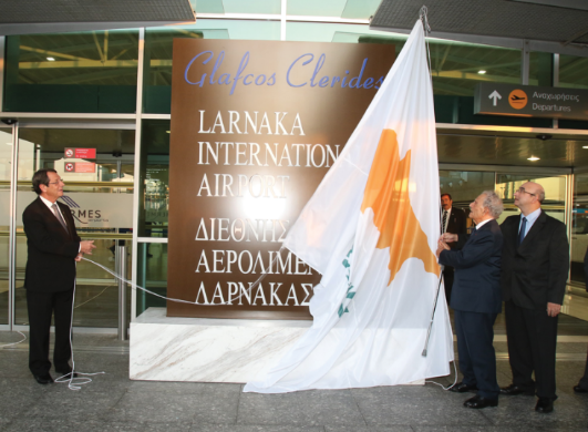 A person holding a flag
Description automatically generated