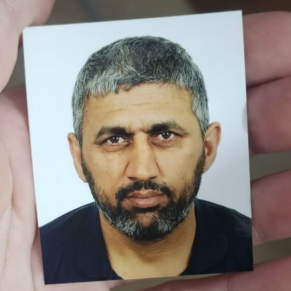 May be an image of one or more people and beard