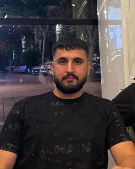 May be an image of one or more people and beard