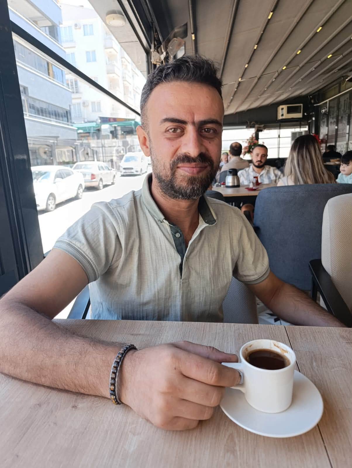 May be an image of one or more people, beard and coffee cup